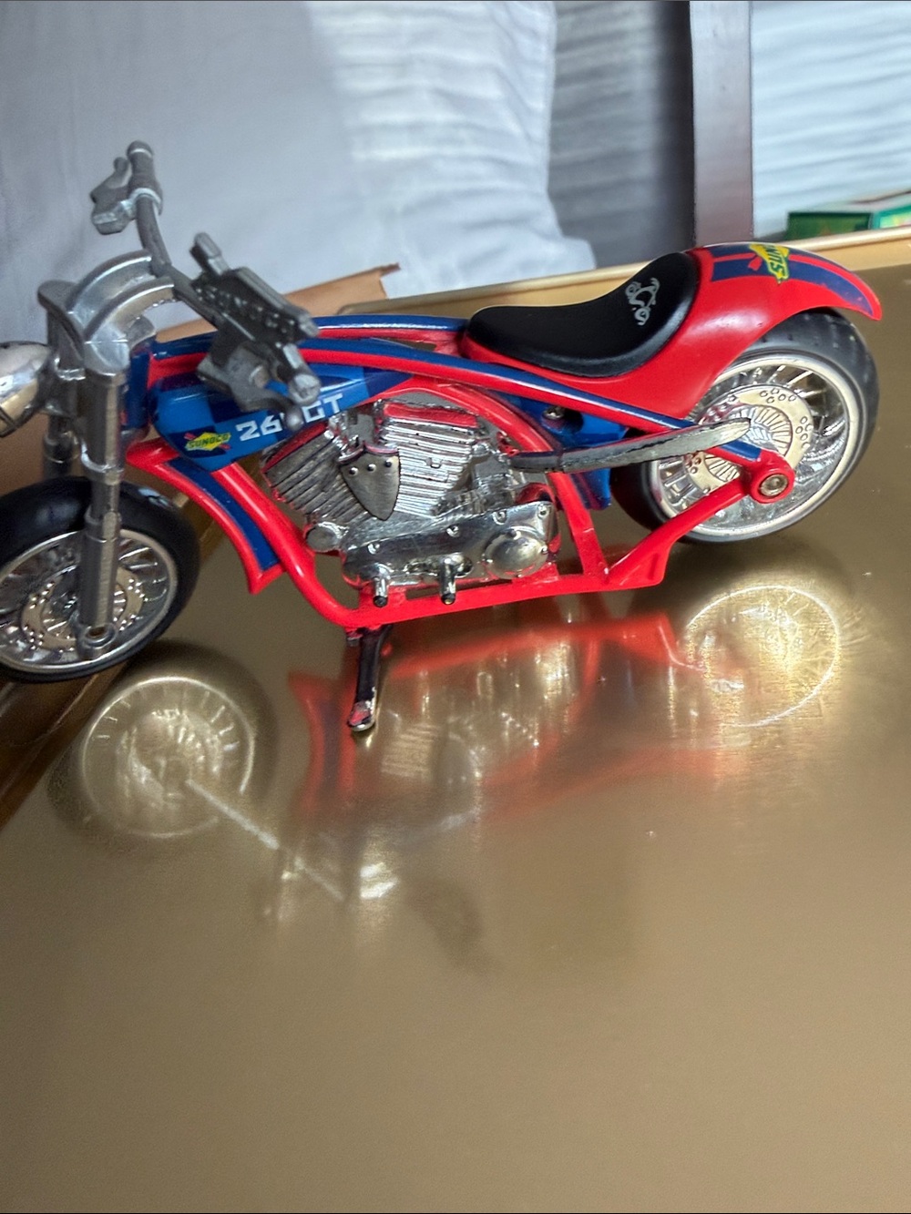 Red and Blue Motorcycle Toy SUNOCO